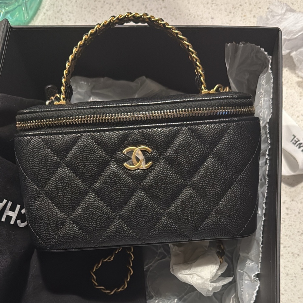 CHANEL Quilted Black Small Bag with Gold Hardware